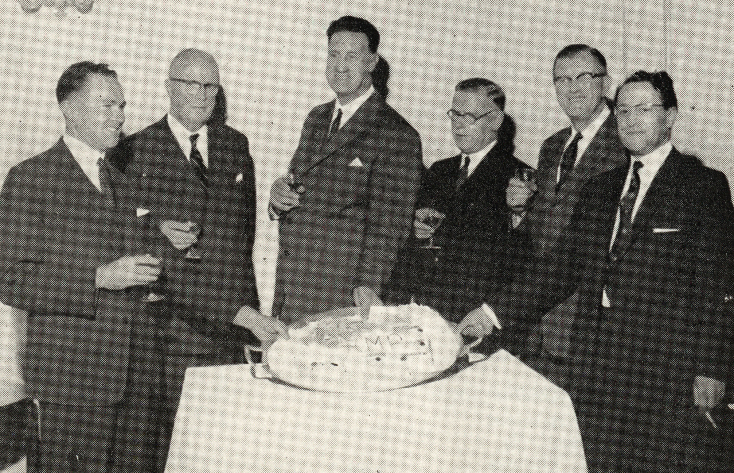 AMP staff and guests from the National Commercial Bank of Scotland attend the opening of AMP's new regional office in Glasgow, Scotland, December 1961 (N434).