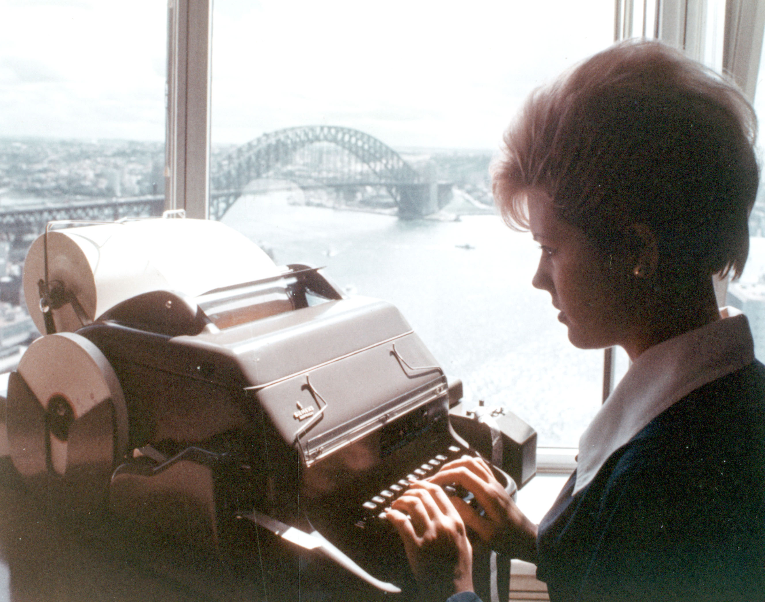 Miss C Snape working on the 25th Floor of the AMP Sydney Cove Building, Sydney, New South Wales, April 1967 (N434-1405).