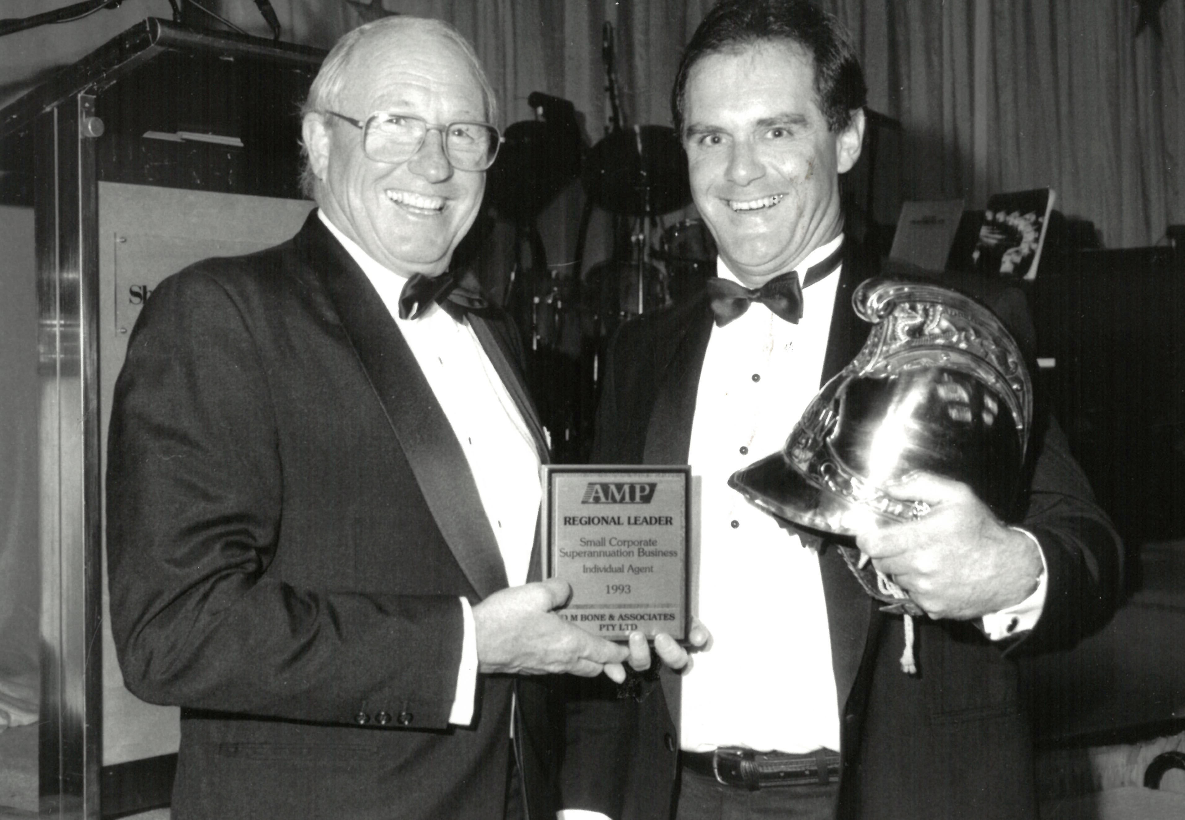 Ben McDonald presenting the Fire Helmet Award for top regional leader to David Bone, 1993 (N434).