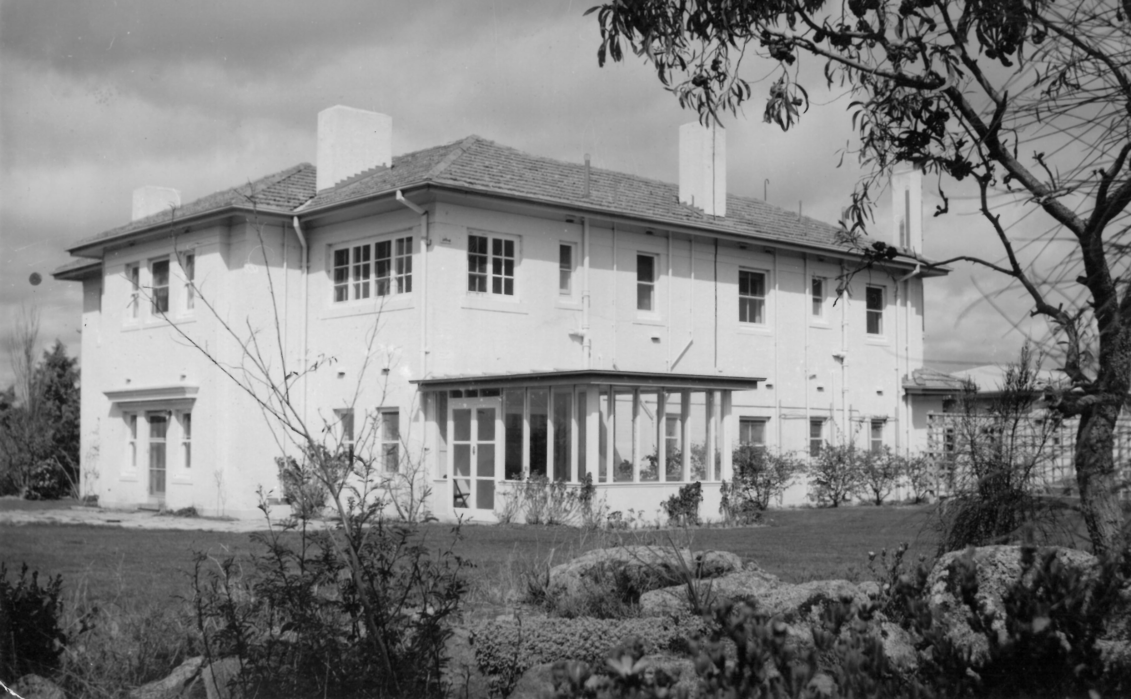 Director's Residence (Observatory House) showing new sun porch, Mount Stromlo Observatory, 1920s (ANUA592-102).