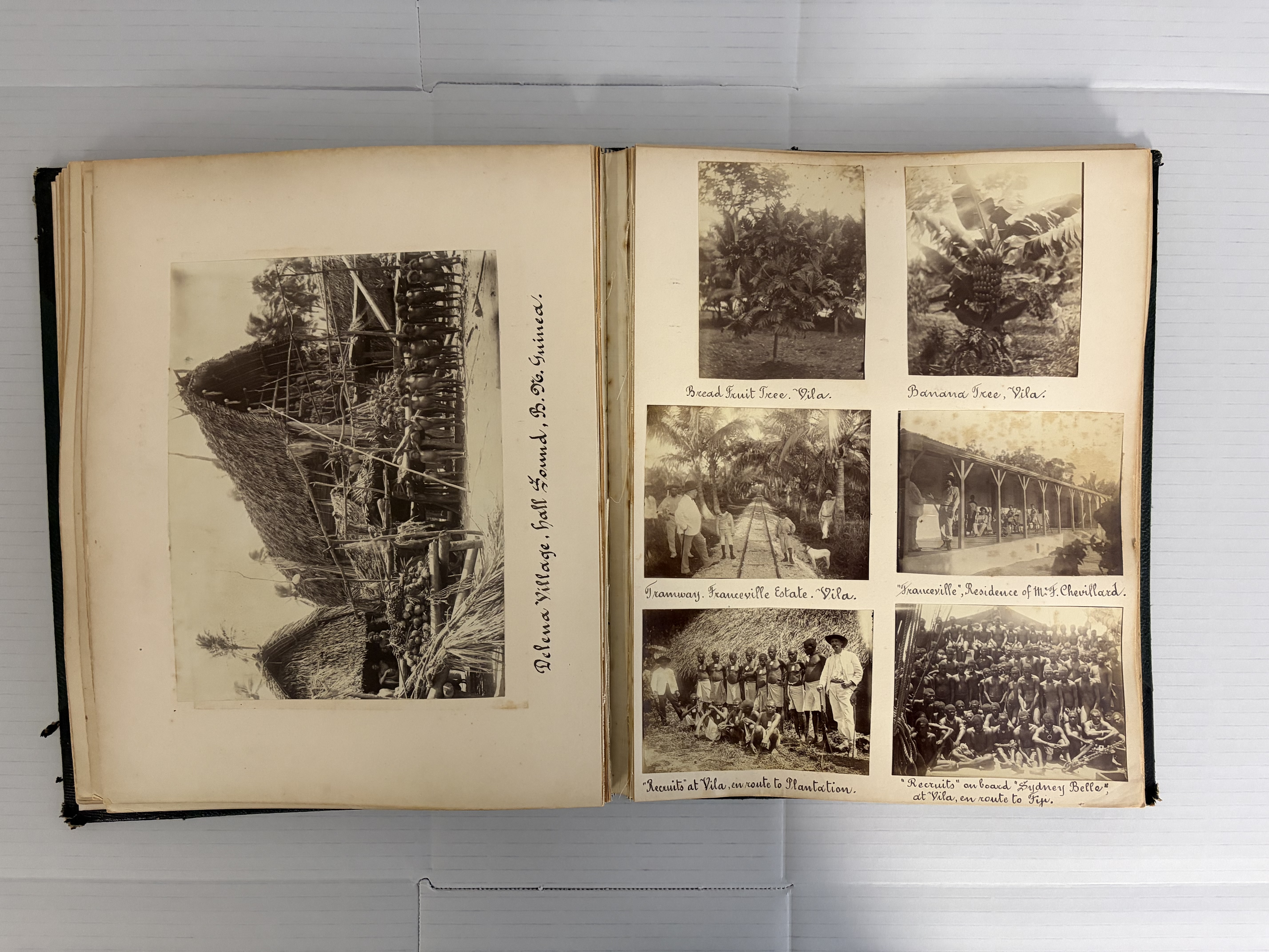 Photograph album with black and white photographs
