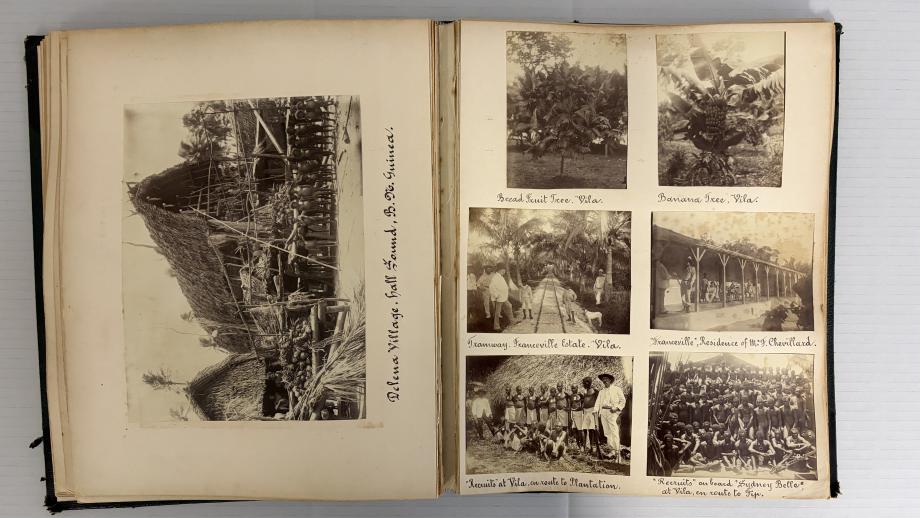 Photograph album with black and white photographs